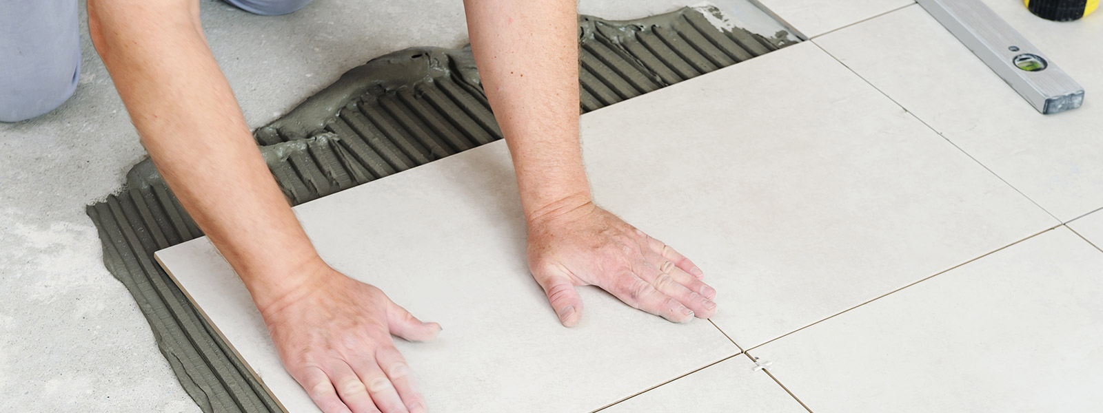 Elevate Spaces with Vision Three: Premier Tile Fixing Company in Dubai